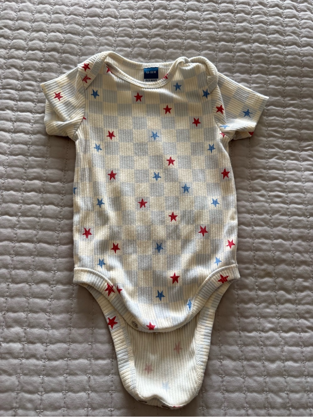 Kids One-Piece Bodysuit in White with Red & Blue Stars - worn once